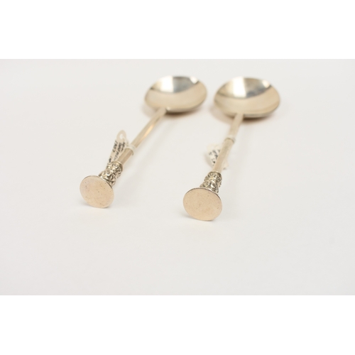 8054 - A pair of Thomas Bradbury and Sons Ltd silver seal top spoons, Sheffield 1907, 19cm long, 158.4g