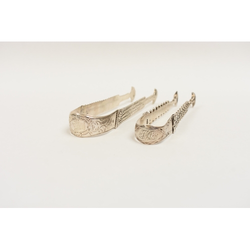 8052 - Two pairs of silver sugar nips, ornate decoration, 76.5g