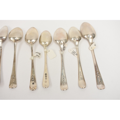 8053 - Twelve various Georgian silver teaspoons, all monogrammed and crested, 186.3g