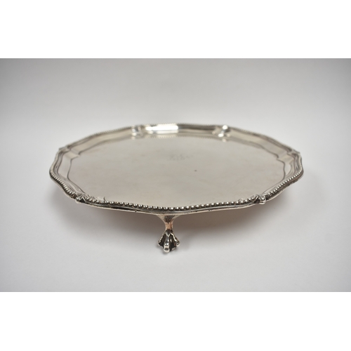 8024 - A George III Samuel Godbehere & Edward Wigan silver salver with central monogram, raised on ball & c... 