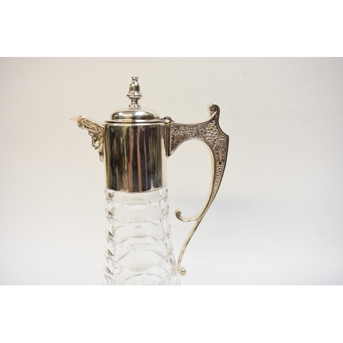 8007 - A Camelot Silver ltd silver necked claret  jug, Sheffield 2000, with crystal glass body retailed by ... 