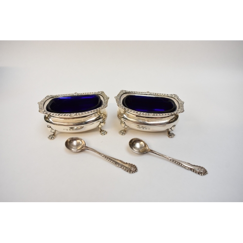 8003 - A pair of E.S. Barnsley & Co silver salts with blue glass liner and spoons, Birmingham 1911, cased, ... 