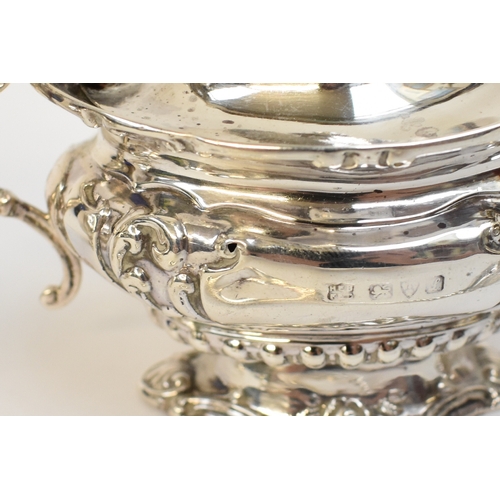 8005 - A cased Barker Brothers cruet set comprising two pepperettes & a mustard, Chester 1911, hole & dent ... 