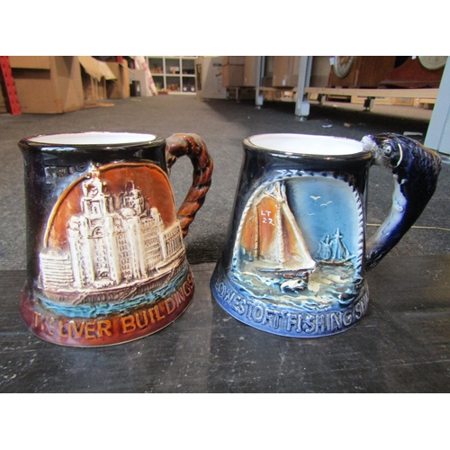 1235 - A large collection of Yarmouth pottery tankards, some limited edition examples