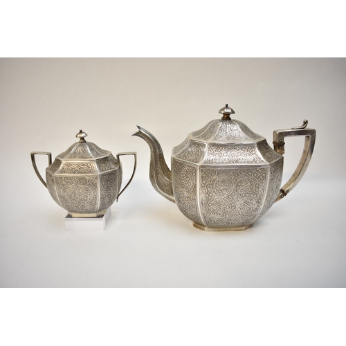 8014 - An Anglo Indian Kashmir silver ornate metal four piece tea set together with four similar spoons, pa... 