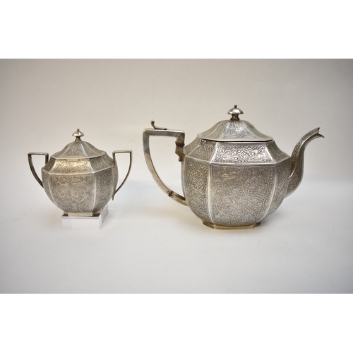 8014 - An Anglo Indian Kashmir silver ornate metal four piece tea set together with four similar spoons, pa... 