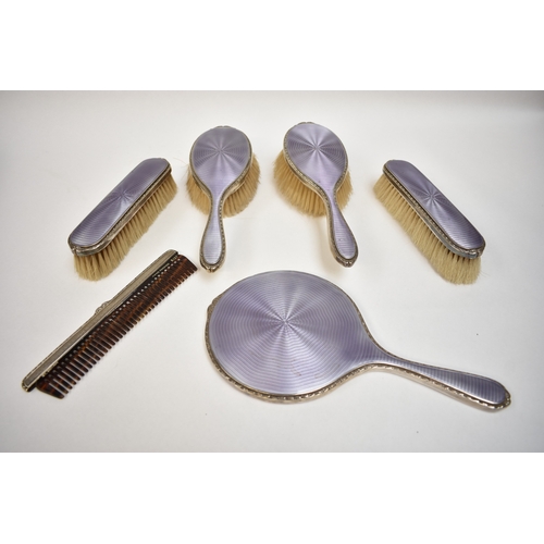 8031 - A cased Walker and Hall dressing table set, art deco purple guilloche design with silver rims, inclu... 