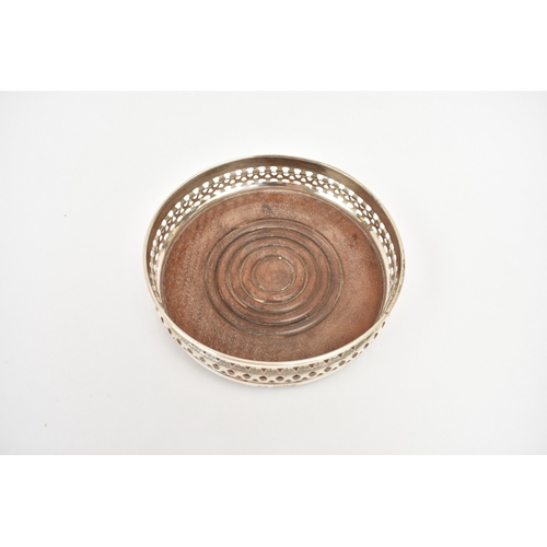 8022 - Nat Joseph silver pierced coaster with engraved star decoration, London 1978, 13cm diameter