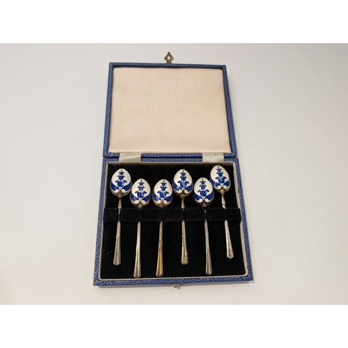8047 - A set of six Turner and Simpson silver spoons with blue enamelled flower decoration to back of bowls... 