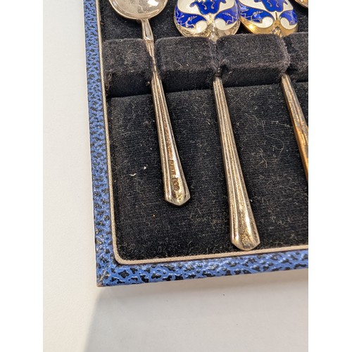 8047 - A set of six Turner and Simpson silver spoons with blue enamelled flower decoration to back of bowls... 