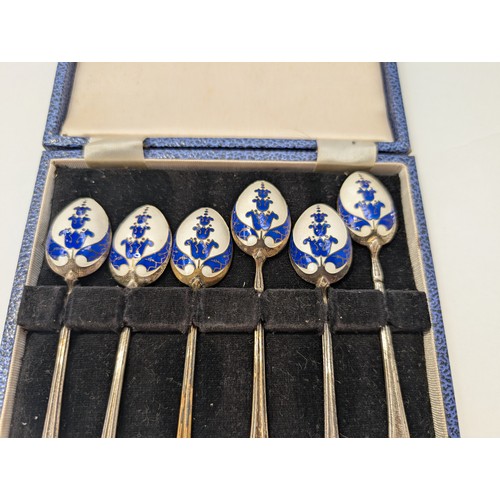 8047 - A set of six Turner and Simpson silver spoons with blue enamelled flower decoration to back of bowls... 