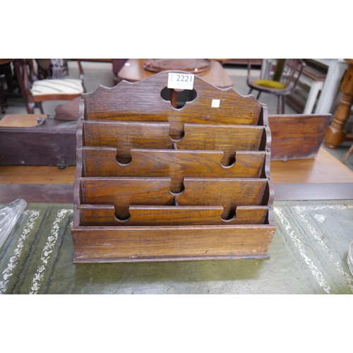 An Edwardian oak letter rack