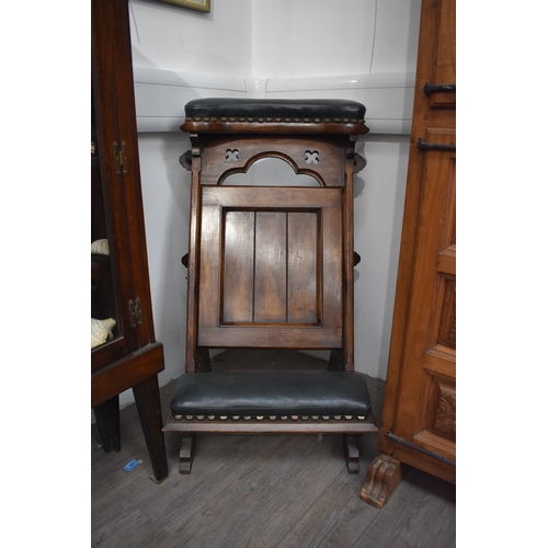 1008 - A Victorian Pugin style Gothic metamorphic chair/kneeler with leather padded rests, 90cm tall x 54cm... 