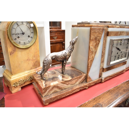 1031 - An Art Deco mantel clock bearing signatures to hounds FH DANVIN, movement by Samuel Martin visible c... 