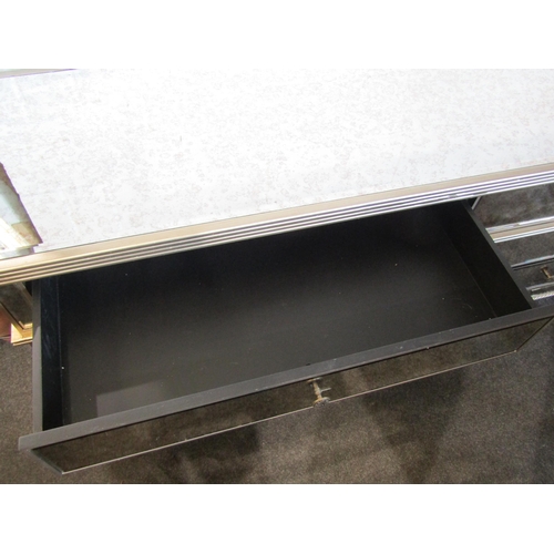 1026 - A mirrored and silvered sideboard with rope twist detail, six drawers, two a/f, 80cm tall x 180cm wi... 