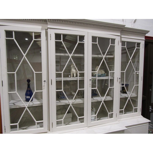 1045 - A white painted astragal glazed breakfront dresser with shelved interior on bracket feet, 203cm tall... 