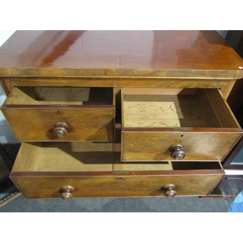 1004 - A Victorian mahogany chest of two short over three graduated long drawers. 103cm width, 46.5cm depth... 