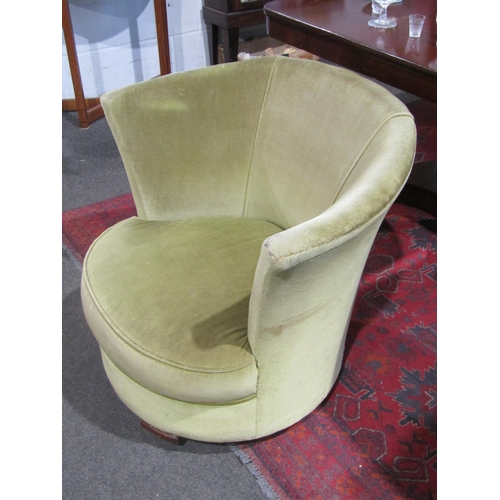 1023 - An Art Deco tub chair in green velour upholstery, 65cm tall x 80cm wide