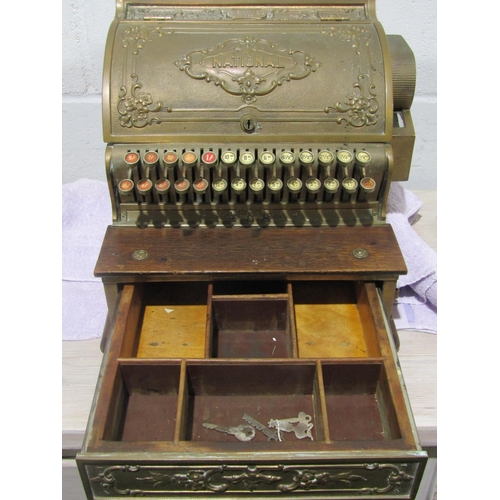 1035 - A National cash register, serial no. 1240373 349 with four keys (in cash drawer)