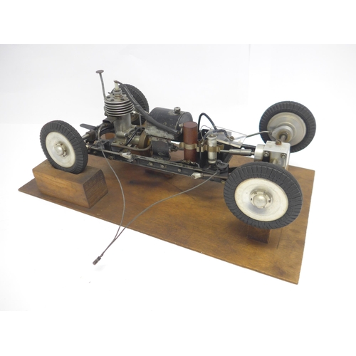 6203 - An M&E Models of Exmouth 'Special' tethered racing car, c.1947, the hand carved wooden body with ori... 
