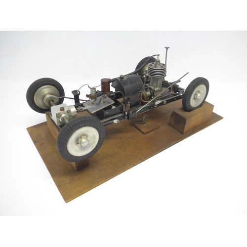 6203 - An M&E Models of Exmouth 'Special' tethered racing car, c.1947, the hand carved wooden body with ori... 