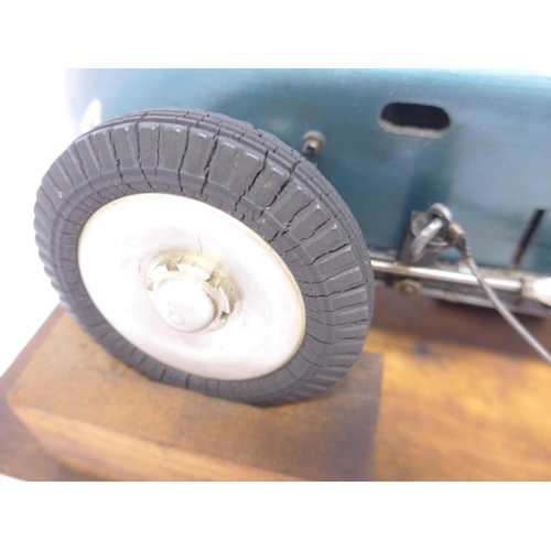 6203 - An M&E Models of Exmouth 'Special' tethered racing car, c.1947, the hand carved wooden body with ori... 