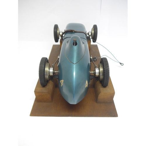 6203 - An M&E Models of Exmouth 'Special' tethered racing car, c.1947, the hand carved wooden body with ori... 