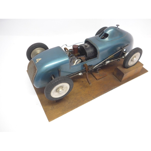 6203 - An M&E Models of Exmouth 'Special' tethered racing car, c.1947, the hand carved wooden body with ori... 