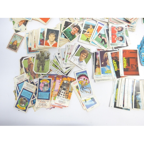 6033A - A collection of film, TV, footballer and other trade cards and stickers, including Panini Football 8... 