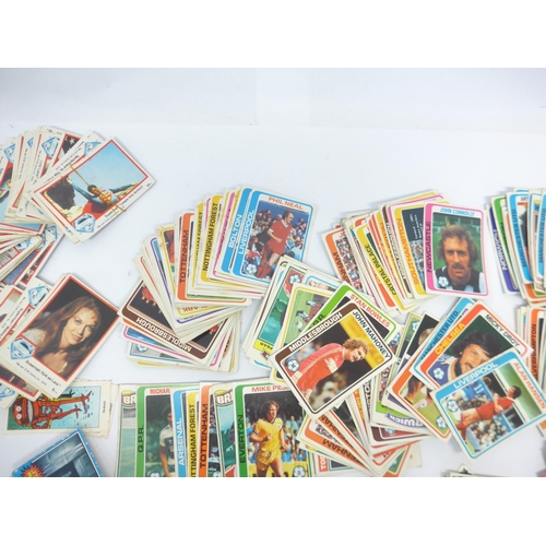 6033A - A collection of film, TV, footballer and other trade cards and stickers, including Panini Football 8... 