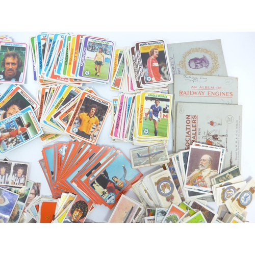6033A - A collection of film, TV, footballer and other trade cards and stickers, including Panini Football 8... 