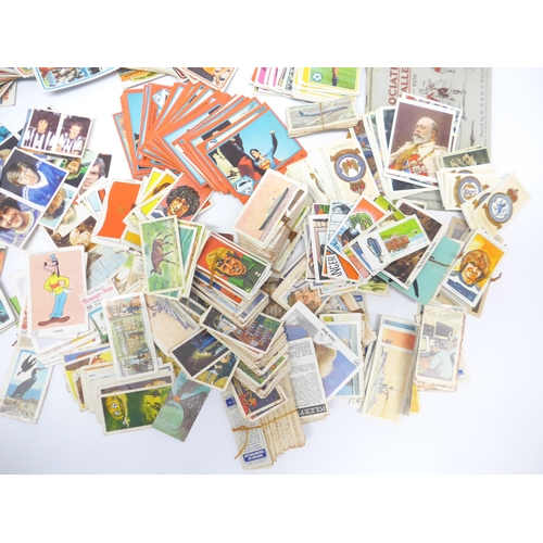 6033A - A collection of film, TV, footballer and other trade cards and stickers, including Panini Football 8... 