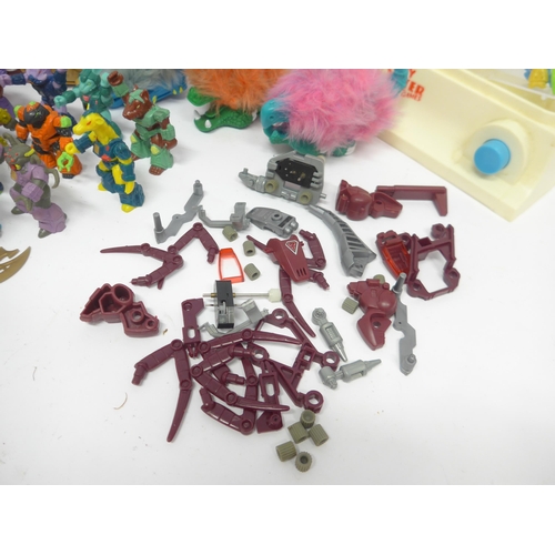 6023 - A collection of 1980s vintage action figures, toys and parts, including twenty Hasbro/Takara Battle ... 