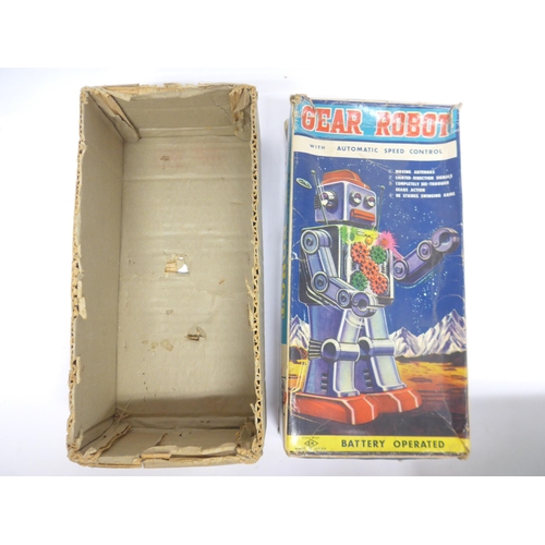 6030 - A boxed 1960s SH / Horikawa (Japan) battery operated Gear Robot with silver tinplate body, clear pla... 