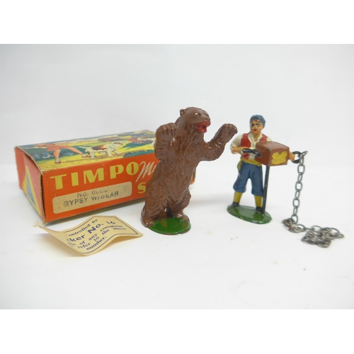 6055 - Four Timpo Toys My Pet Series lead figures, comprising no.6000 Gypsy with Bear (x2, one missing Gyps... 