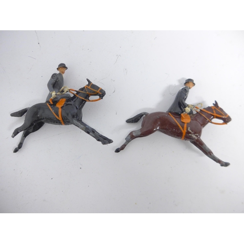 6058 - A collection of Britains Hunting Series painted lead figures, comprising six huntsmen and huntswomen... 