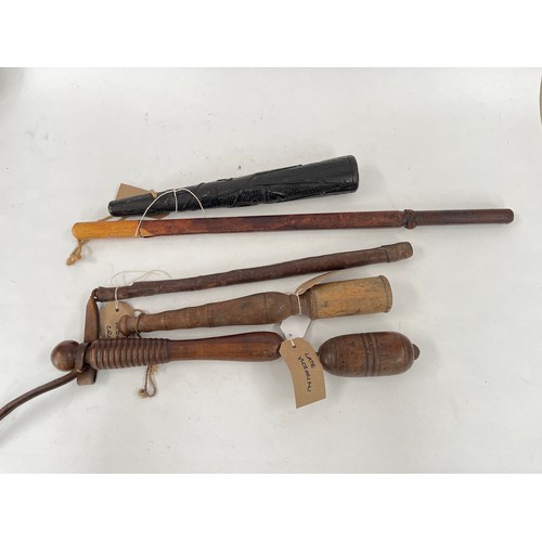A quantity of items including tipstaff, weighted riding crop and a two ...