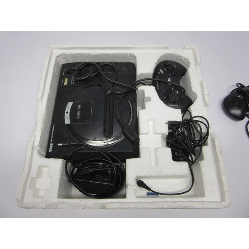 6008 - Retro Gaming - A SEGA Mega Drive video games console with four games to include 