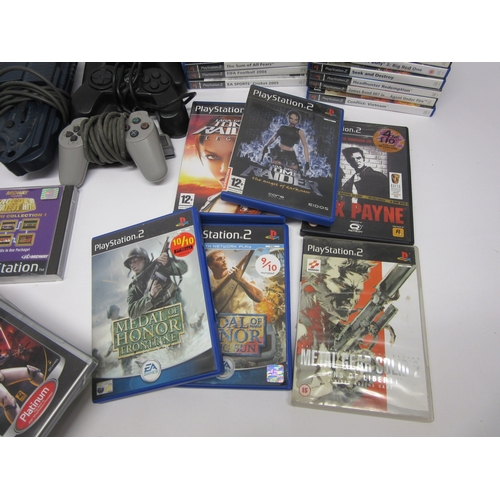 6013 - Retro Gaming - A Sony Playstation 1 video games console with assorted Playstation 1, 2 & PSP games i... 