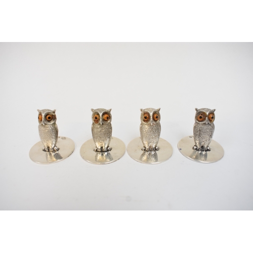 5029 - A set of eight Asprey of London silver owl menu/place setting holders, London 1969, 3.2cm tall, in A... 