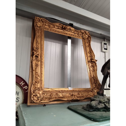 A large rectangular gilt framed picture frame 52x64cm aperture