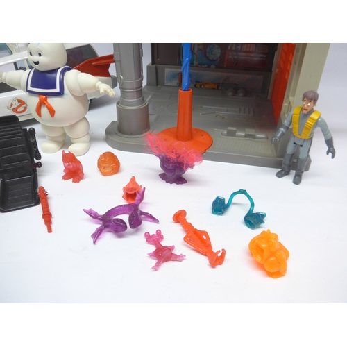 6025 - A The Real Ghostbusters Firehouse Headquarters playset, various figures including Staypuft Man and F... 