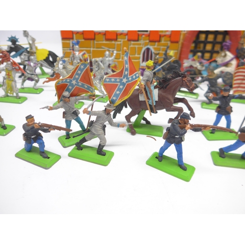 6057 - A collection of approximately forty-five Britains and Britains Deetail plastic figures including Kni... 