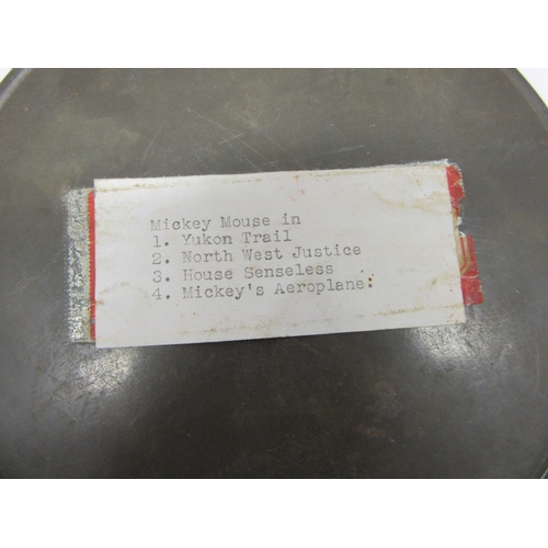 6051 - Two Disney Mickey Mouse film reels in metal canisters (2)