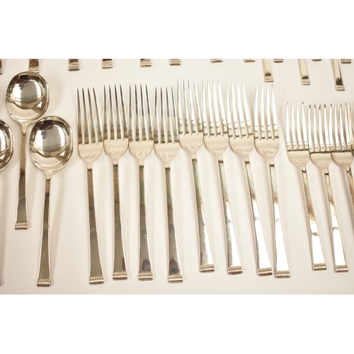 5106 - A Cooper Brothers & Sons Ltd silver eight place canteen of cutlery comprising four serving spoons, e... 