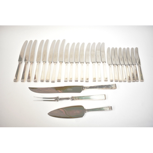 5106 - A Cooper Brothers & Sons Ltd silver eight place canteen of cutlery comprising four serving spoons, e... 