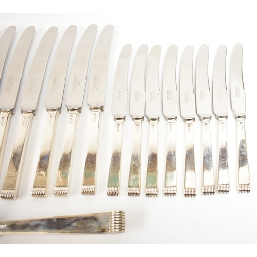 5106 - A Cooper Brothers & Sons Ltd silver eight place canteen of cutlery comprising four serving spoons, e... 