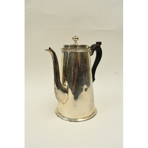 5015 - A Harrod Ltd silver coffee pot of plain form with knop finial and treen handle, London 1969, base in... 