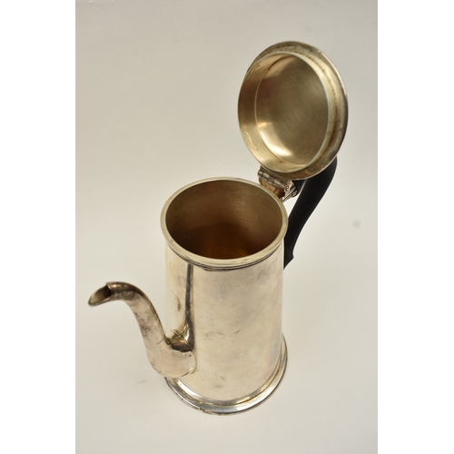 5015 - A Harrod Ltd silver coffee pot of plain form with knop finial and treen handle, London 1969, base in... 