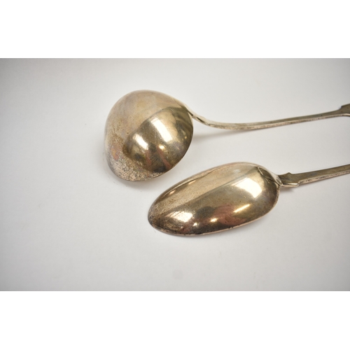 5094 - An Elizabeth Eaton silver soup serving ladle, London 1857 and Henry Hollard silver basting spoon, Lo... 
